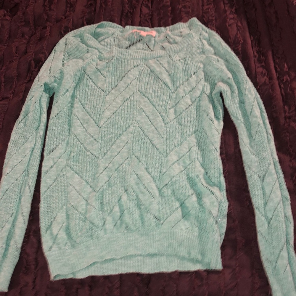 turquoise sweater